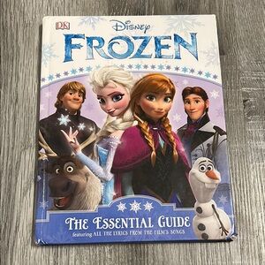 Disney Frozen The Essential Guide Book